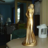 Gold Colored Lady Statue