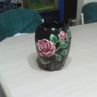 Black Vase with Roses on it
